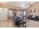 Bright living room with a bay window and tiled floors at 8934 W Ocotillo Rd, Glendale, AZ 85305