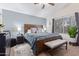 Spacious main bedroom with a large bed and window at 8934 W Ocotillo Rd, Glendale, AZ 85305