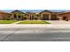 Charming single-Gathering home featuring a well-maintained front yard and inviting curb appeal at 14539 W Sheridan St, Goodyear, AZ 85395