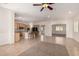 Open concept kitchen with wooden cabinets and island seating, perfect for modern living at 14539 W Sheridan St, Goodyear, AZ 85395