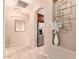 Hallway view of kitchen with stainless steel appliances at 1653 W Glenhaven Dr, Phoenix, AZ 85045