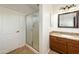 Bathroom with granite countertop, single sink, and shower at 1763 S Red Rock St, Gilbert, AZ 85295