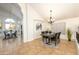 Bright dining room with table and chairs near kitchen at 1763 S Red Rock St, Gilbert, AZ 85295
