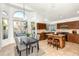 Bright kitchen with island, stainless steel appliances, and ample cabinet space at 1763 S Red Rock St, Gilbert, AZ 85295