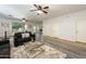 Spacious living room with wood-look floors and ample natural light at 1763 S Red Rock St, Gilbert, AZ 85295