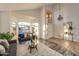 Spacious living room with high ceilings and large windows at 1763 S Red Rock St, Gilbert, AZ 85295
