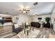 Living area features wood-look floors and ceiling fans at 1763 S Red Rock St, Gilbert, AZ 85295