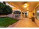 Covered patio with ceiling fan, adjacent to the pool at 1763 S Red Rock St, Gilbert, AZ 85295