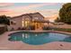 Inviting kidney shaped pool and patio area at 1763 S Red Rock St, Gilbert, AZ 85295