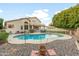 Relaxing kidney shaped pool with pebble tec finish at 1763 S Red Rock St, Gilbert, AZ 85295