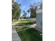 Walkway leading to the community pool with lush landscaping at 2687 W Ocotillo Rd, Phoenix, AZ 85017