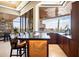 Indoor bar with mountain views and sleek cabinetry at 42493 N 108Th St, Scottsdale, AZ 85262