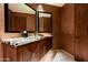 Upscale bathroom with granite countertop and wood cabinets at 42493 N 108Th St, Scottsdale, AZ 85262