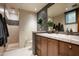 Modern bathroom with walk-in shower and floating vanity at 42493 N 108Th St, Scottsdale, AZ 85262