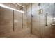 Spa-like shower with built-in bench and modern fixtures at 42493 N 108Th St, Scottsdale, AZ 85262