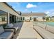 Gorgeous backyard boasts a refreshing pool, outdoor dining, and cozy lounge spaces perfect for entertaining at 6040 E Lafayette Blvd, Scottsdale, AZ 85251