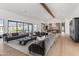 Spacious living room with modern decor, plush sofas, and hardwood floors, creating a comfortable and stylish atmosphere at 6040 E Lafayette Blvd, Scottsdale, AZ 85251
