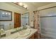 Clean bathroom with a tub, shower, and updated vanity at 6074 E Los Reales Dr, Carefree, AZ 85377