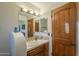 Clean bathroom with wood vanity and updated fixtures at 6074 E Los Reales Dr, Carefree, AZ 85377