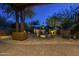 Peaceful courtyard with fountain and seating area at 6074 E Los Reales Dr, Carefree, AZ 85377