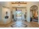 Elegant entryway with tile floors and views to the courtyard at 6074 E Los Reales Dr, Carefree, AZ 85377