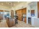 Island kitchen with granite countertops and ample cabinet space at 6074 E Los Reales Dr, Carefree, AZ 85377