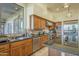 Spacious kitchen with stainless steel appliances and granite countertops at 6074 E Los Reales Dr, Carefree, AZ 85377