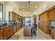 Gourmet kitchen with island and stainless steel appliances at 6074 E Los Reales Dr, Carefree, AZ 85377