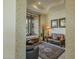 Cozy living room with leather furniture and large windows at 6074 E Los Reales Dr, Carefree, AZ 85377