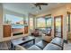 Open living room with large windows and mountain views at 6074 E Los Reales Dr, Carefree, AZ 85377