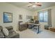 Home office with a desk, chair, and ample natural light at 6074 E Los Reales Dr, Carefree, AZ 85377