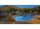 Blue pool and spa with mountain views at 6074 E Los Reales Dr, Carefree, AZ 85377
