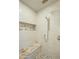 Large walk-in shower with tiled walls and built-in seat at 6074 E Los Reales Dr, Carefree, AZ 85377