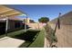 Spacious backyard with covered patio and grassy area at 625 N 38Th N St, Mesa, AZ 85205