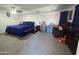Spacious bedroom with a queen bed and carpeted floor at 625 N 38Th N St, Mesa, AZ 85205