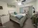 Cozy bedroom with a queen-size bed and window seat at 625 N 38Th N St, Mesa, AZ 85205