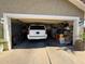 Two-car garage with ample storage space and a large door at 625 N 38Th N St, Mesa, AZ 85205