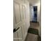 Bright hallway with wood-look floors and access to bedrooms at 625 N 38Th N St, Mesa, AZ 85205