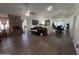 Open concept living room with a fireplace and adjoining dining area at 625 N 38Th N St, Mesa, AZ 85205