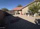 Large side yard with paved driveway and gate at 625 N 38Th N St, Mesa, AZ 85205
