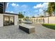 Relaxing backyard oasis with a sparkling pool and fire pit at 1302 W Golden Ln, Phoenix, AZ 85021