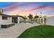 Backyard features a pool, patio, and grassy lawn at 1302 W Golden Ln, Phoenix, AZ 85021