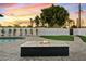 Backyard with fire pit and view of pool and lawn at 1302 W Golden Ln, Phoenix, AZ 85021