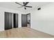 Spacious bedroom with ample closet space and light flooring at 1302 W Golden Ln, Phoenix, AZ 85021