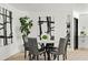 Modern dining area with a round table and four gray chairs at 1302 W Golden Ln, Phoenix, AZ 85021