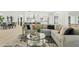 Open living space showcasing a comfortable sectional sofa and kitchen views at 1302 W Golden Ln, Phoenix, AZ 85021