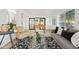 Open living space with foosball table and view into backyard at 1302 W Golden Ln, Phoenix, AZ 85021