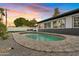 Beautiful pool and patio area at sunset at 1302 W Golden Ln, Phoenix, AZ 85021