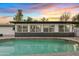 Modern pool with large windows and patio at 1302 W Golden Ln, Phoenix, AZ 85021
