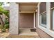 Covered entryway featuring neutral colors and tasteful landscaping creating a welcoming entrance to the home at 15221 N Clubgate Dr # 1110, Scottsdale, AZ 85254